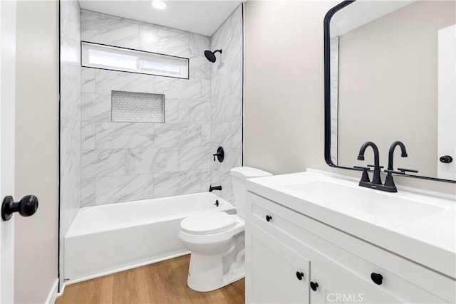 7364 Layton St, Rancho Cucamonga, CA 91730 - full bathroom featuring vanity, wood finished floors, and washtub / shower combination