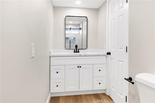 7364 Layton St, Rancho Cucamonga, CA 91730 - bathroom with vanity and wood finished floors