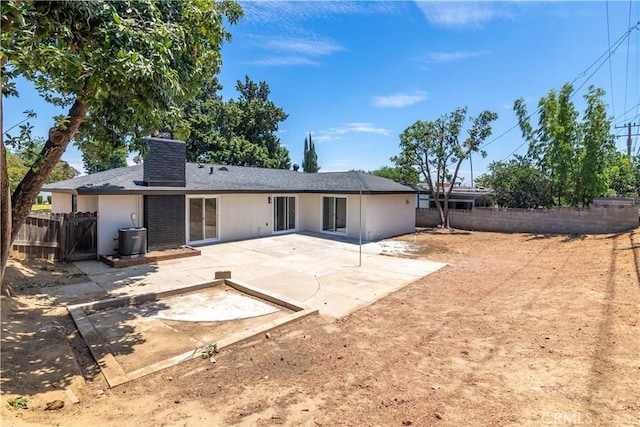7364 Layton St, Rancho Cucamonga, CA 91730 - back of property with a patio and a chimney