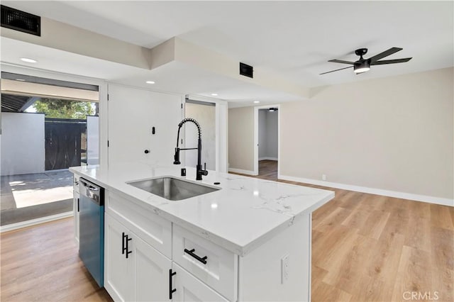 7364 Layton St, Rancho Cucamonga, CA 91730 - kitchen with dishwasher, white cabinets, light wood finished floors, an island with sink, and recessed lighting