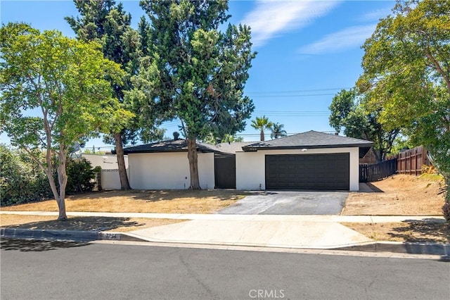7364 Layton St, Rancho Cucamonga, CA 91730 - ranch-style house featuring stucco siding, a garage, and driveway