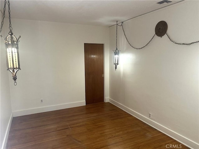 1316 Elm St, Alhambra, CA 91803 - empty room with wood finished floors and a chandelier