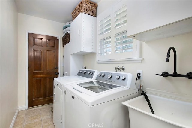 829 N Foxdale Ave, West Covina, CA 91790 - laundry area with separate washer and dryer, light tile patterned floors, and cabinet space