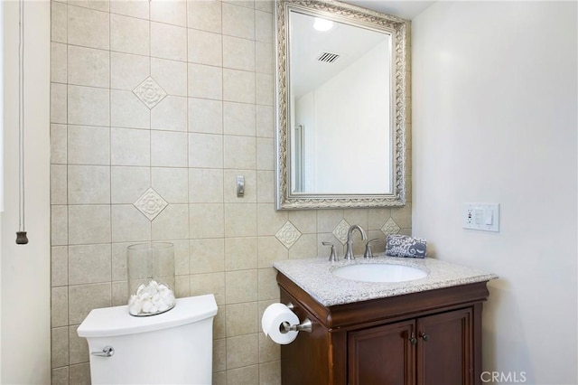 829 N Foxdale Ave, West Covina, CA 91790 - bathroom with vanity and tile walls