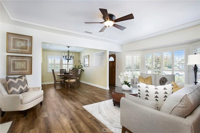 829 N Foxdale Ave, West Covina, CA 91790 - living room featuring a chandelier, dark wood-style floors, and a ceiling fan