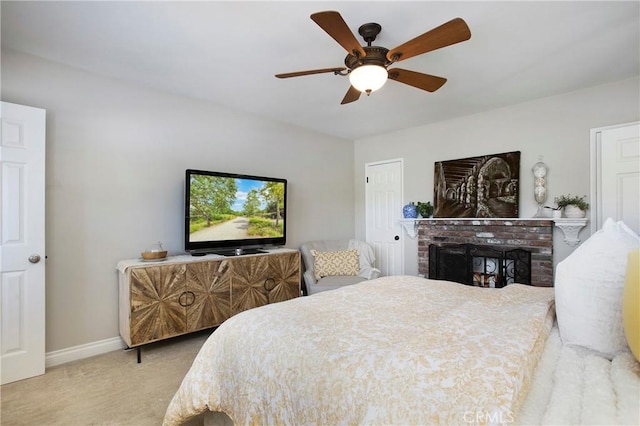 829 N Foxdale Ave, West Covina, CA 91790 - carpeted bedroom with a fireplace and a ceiling fan