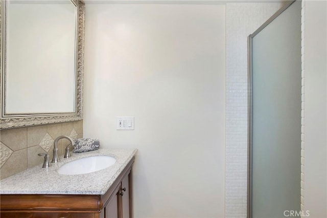 829 N Foxdale Ave, West Covina, CA 91790 - full bath featuring vanity, backsplash, and an enclosed shower