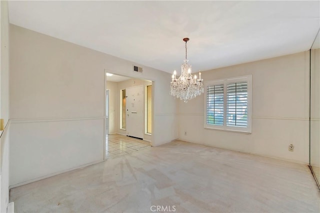 1318 Sao Paulo Ave, Placentia, CA 92870 - spare room with a chandelier and carpet