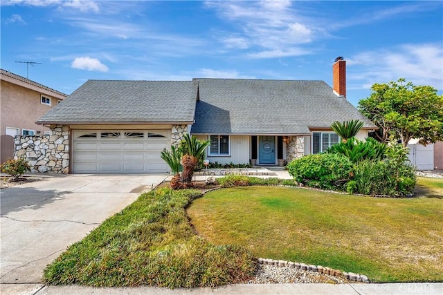1318 Sao Paulo Ave, Placentia, CA 92870 - view of front of house with stone siding, an attached garage, a front yard, a chimney, and driveway