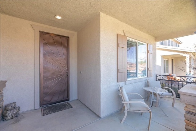 32765 Santa Cruz, Lake Elsinore, CA 92530 - view of exterior entry with stucco siding and covered porch
