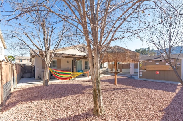 32765 Santa Cruz, Lake Elsinore, CA 92530 - back of property featuring a gate and stucco siding