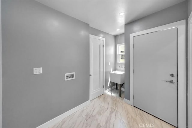 2049 W 71st St, Los Angeles, CA 90047 - hallway with light marble finish flooring and recessed lighting
