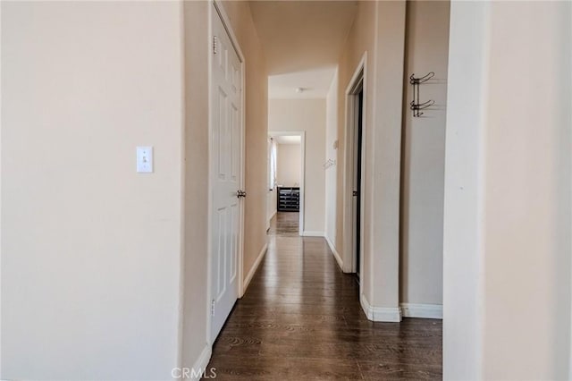11818 Forest Park Ln, Victorville, CA 92392 - hall featuring dark wood-type flooring and baseboards