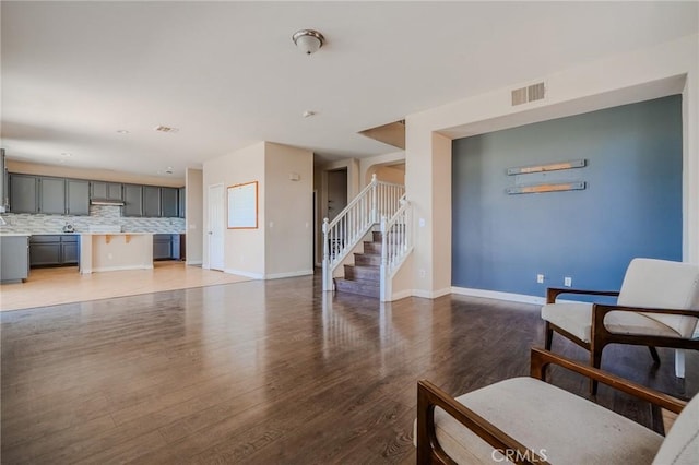 11818 Forest Park Ln, Victorville, CA 92392 - living area with stairs and light wood-style flooring