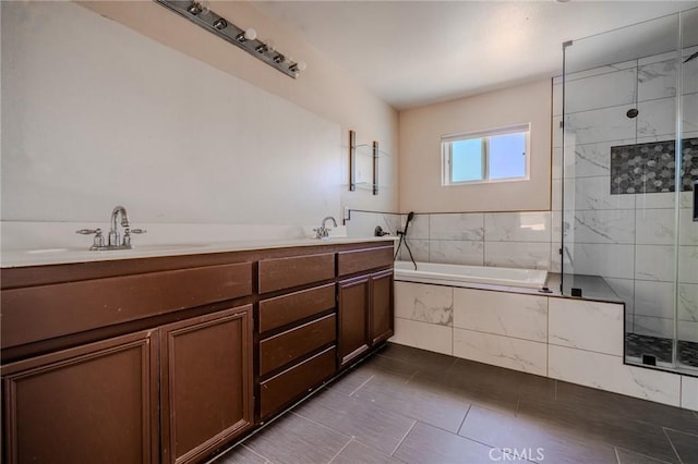 11818 Forest Park Ln, Victorville, CA 92392 - bathroom with a garden tub, tiled shower, tile patterned floors, and double vanity