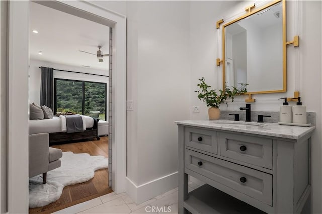 3325 Sagewood Hills Rd, Vista, CA 92084 - bathroom featuring vanity, ensuite bath, and ceiling fan