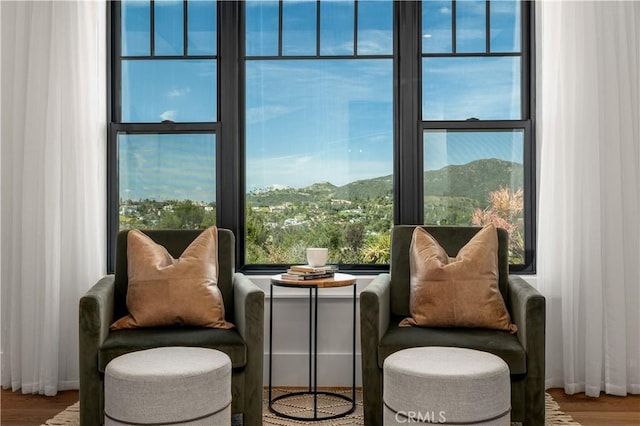 3325 Sagewood Hills Rd, Vista, CA 92084 - sitting room with wood finished floors and a mountain view