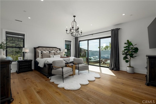 3325 Sagewood Hills Rd, Vista, CA 92084 - bedroom featuring access to outside, a chandelier, light wood-style flooring, and recessed lighting