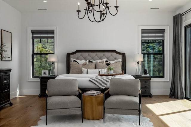 3325 Sagewood Hills Rd, Vista, CA 92084 - bedroom with a chandelier, wood finished floors, and recessed lighting