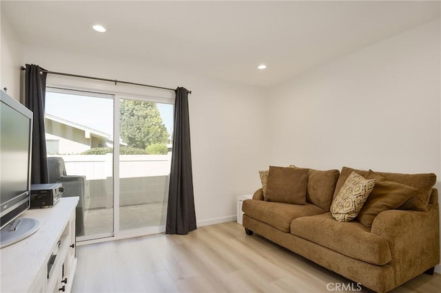 8645 Butte Cir Unit 603C, Huntington Beach, CA 92646 - living area featuring light wood-type flooring and recessed lighting