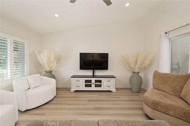 8645 Butte Cir Unit 603C, Huntington Beach, CA 92646 - living area with light wood-style floors, recessed lighting, and a ceiling fan