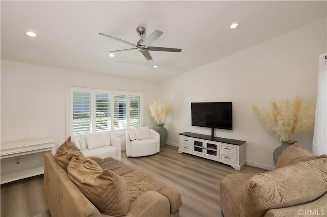 8645 Butte Cir Unit 603C, Huntington Beach, CA 92646 - living area featuring ceiling fan, recessed lighting, and wood finished floors