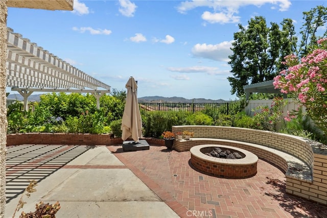 808 Links View Dr, Simi Valley, CA 93065 - fenced backyard featuring a patio, an outdoor fire pit, a pergola, and a mountain view