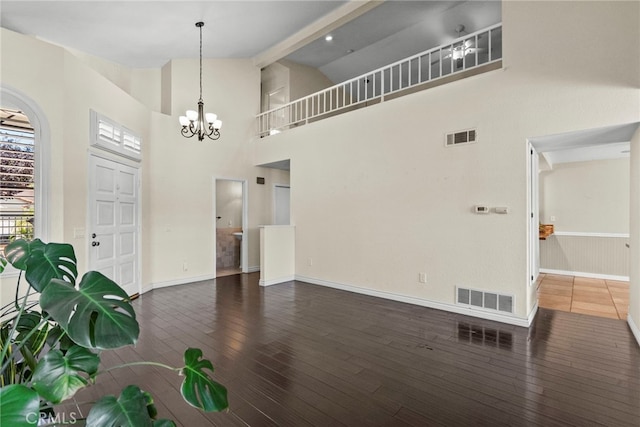 808 Links View Dr, Simi Valley, CA 93065 - empty room featuring hardwood / wood-style floors, a chandelier, and high vaulted ceiling