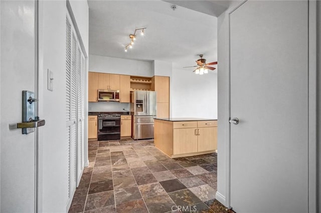388 E Ocean Blvd Unit 1215, Long Beach, CA 90802 - kitchen featuring appliances with stainless steel finishes, light brown cabinetry, ceiling fan, dark stone finish flooring, and open shelves