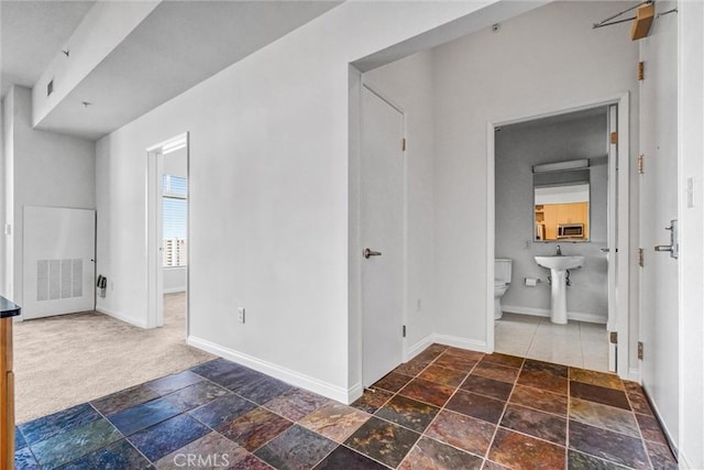 388 E Ocean Blvd Unit 1215, Long Beach, CA 90802 - empty room featuring stone tile floors and baseboards