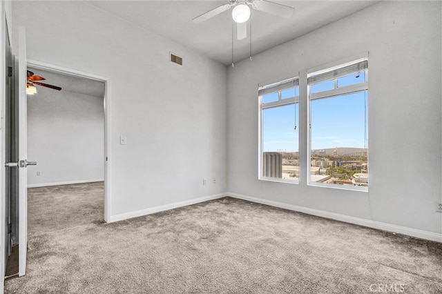 388 E Ocean Blvd Unit 1215, Long Beach, CA 90802 - spare room featuring a ceiling fan and carpet floors
