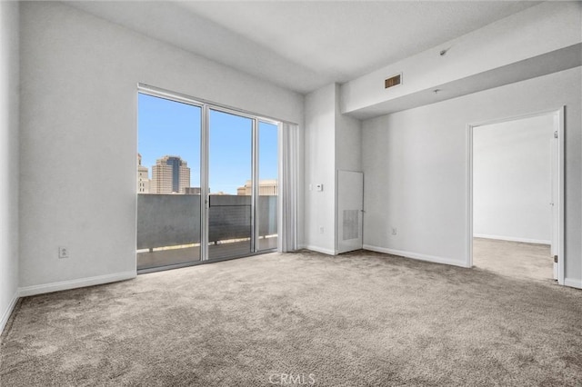 388 E Ocean Blvd Unit 1215, Long Beach, CA 90802 - unfurnished room featuring carpet floors and baseboards