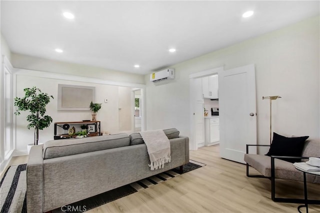293 E Congress St, Colton, CA 92324 - living area featuring a wall mounted air conditioner, light wood finished floors, and recessed lighting
