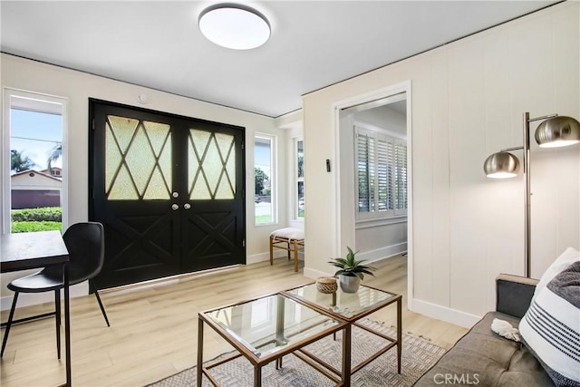 293 E Congress St, Colton, CA 92324 - living room featuring light wood finished floors and healthy amount of natural light