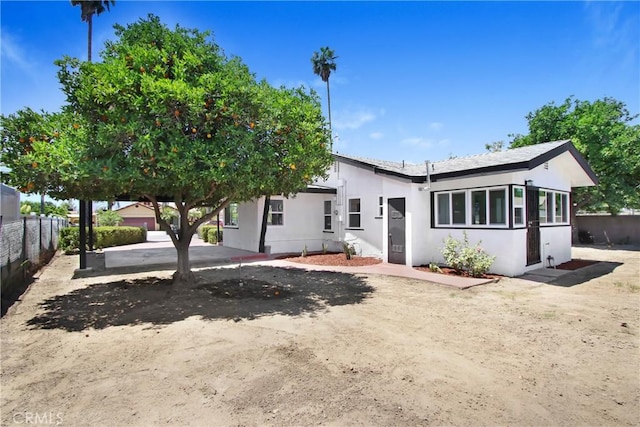 293 E Congress St, Colton, CA 92324 - back of house featuring stucco siding