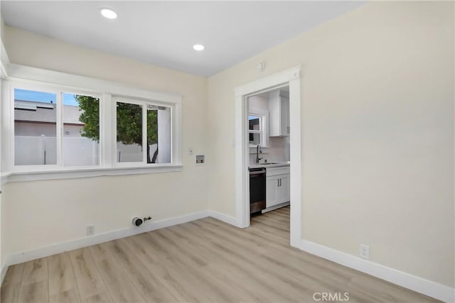 293 E Congress St, Colton, CA 92324 - empty room with light wood-style flooring and recessed lighting