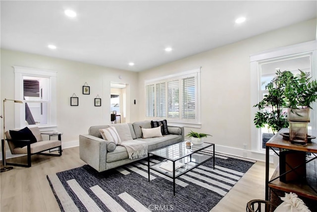 293 E Congress St, Colton, CA 92324 - living area featuring light wood-type flooring and recessed lighting