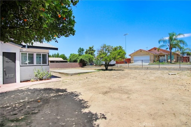 293 E Congress St, Colton, CA 92324 - view of yard with a garage