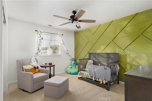 1101 Admiral Ln, Chico, CA 95973 - carpeted bedroom featuring a nursery area and a ceiling fan