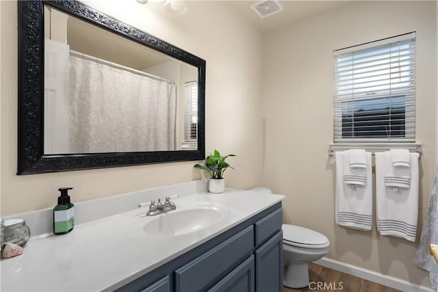 1101 Admiral Ln, Chico, CA 95973 - full bathroom featuring vanity and wood finished floors