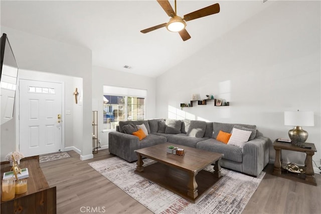 1101 Admiral Ln, Chico, CA 95973 - living area featuring light wood-style flooring, ceiling fan, and high vaulted ceiling