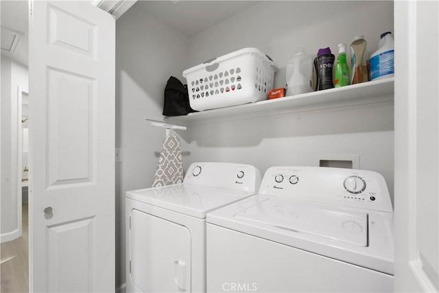 1101 Admiral Ln, Chico, CA 95973 - laundry room with independent washer and dryer and wood finished floors