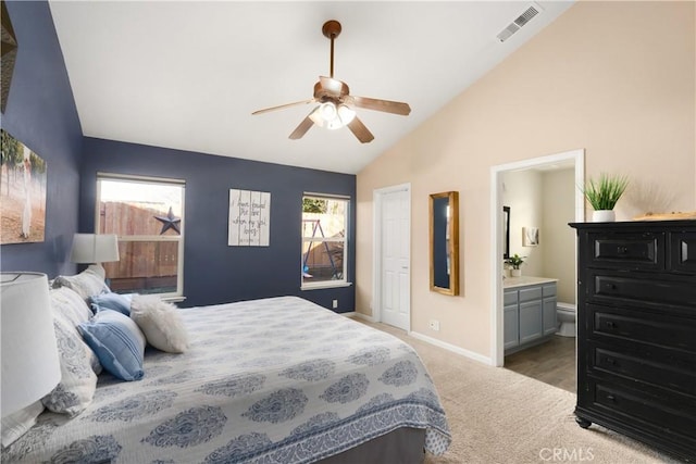 1101 Admiral Ln, Chico, CA 95973 - bedroom with vaulted ceiling, carpet flooring, connected bathroom, and ceiling fan