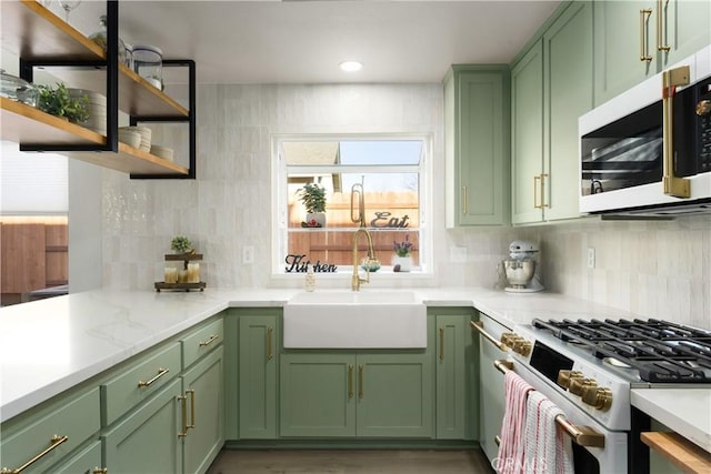 1101 Admiral Ln, Chico, CA 95973 - kitchen featuring green cabinets, stainless steel microwave, white range with gas cooktop, and recessed lighting