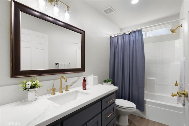 1101 Admiral Ln, Chico, CA 95973 - full bath with vanity, shower / bath combination with curtain, and wood finished floors