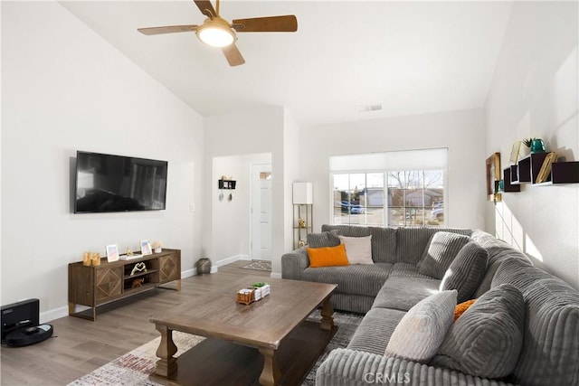 1101 Admiral Ln, Chico, CA 95973 - living area with a ceiling fan, wood finished floors, and vaulted ceiling