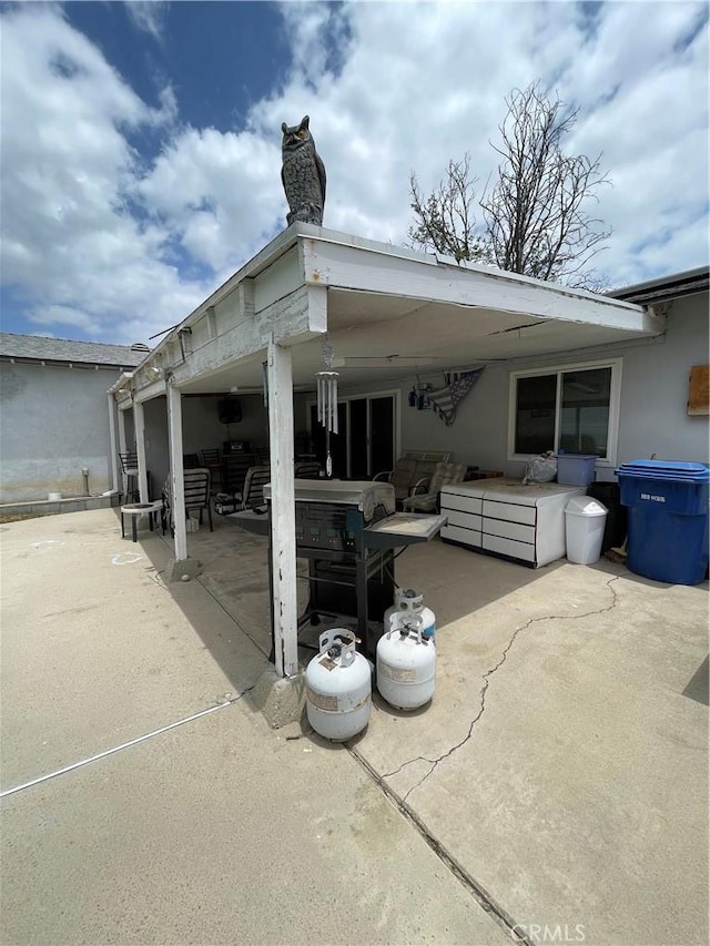 7957 Sausalito Ave, West Hills, CA 91304 - rear view of house featuring an outdoor hangout area and a patio area