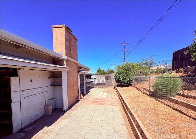 27294 Pinehurst Rd, Menifee, CA 92586 - fenced backyard featuring a patio