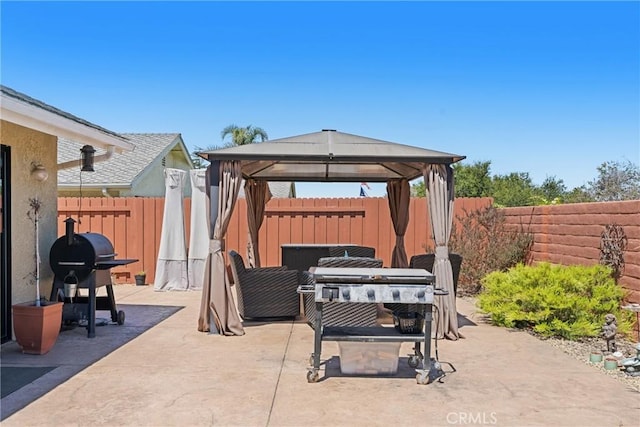 1269 Country Hill Rd, Santa Maria, CA 93455 - fenced backyard featuring a gazebo, grilling area, a patio, and a fire pit