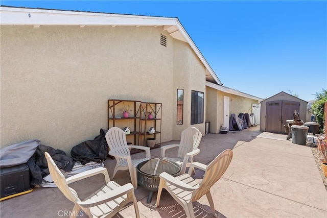 1269 Country Hill Rd, Santa Maria, CA 93455 - view of patio / terrace featuring a storage unit and a fire pit